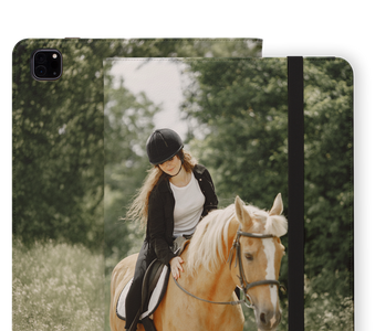 A tablet case featuring a custom printed photo of a woman riding a light brown horse in an outdoor forest setting. The case has a black camera cutout on the top left and a black vertical band on the right side.